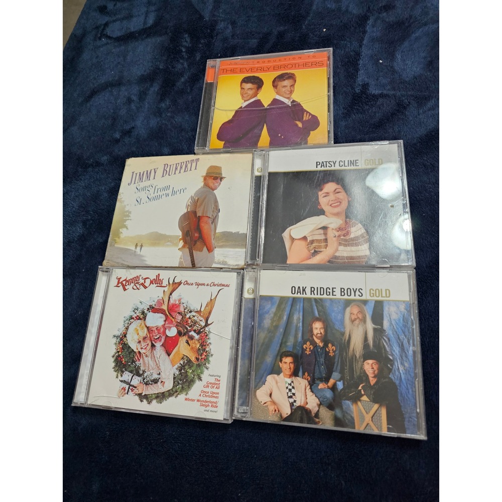 Lot of CDs Jimmy Buffett Patsy Cline Oak Ridge Boys Everly Brothers Kenny Dolly